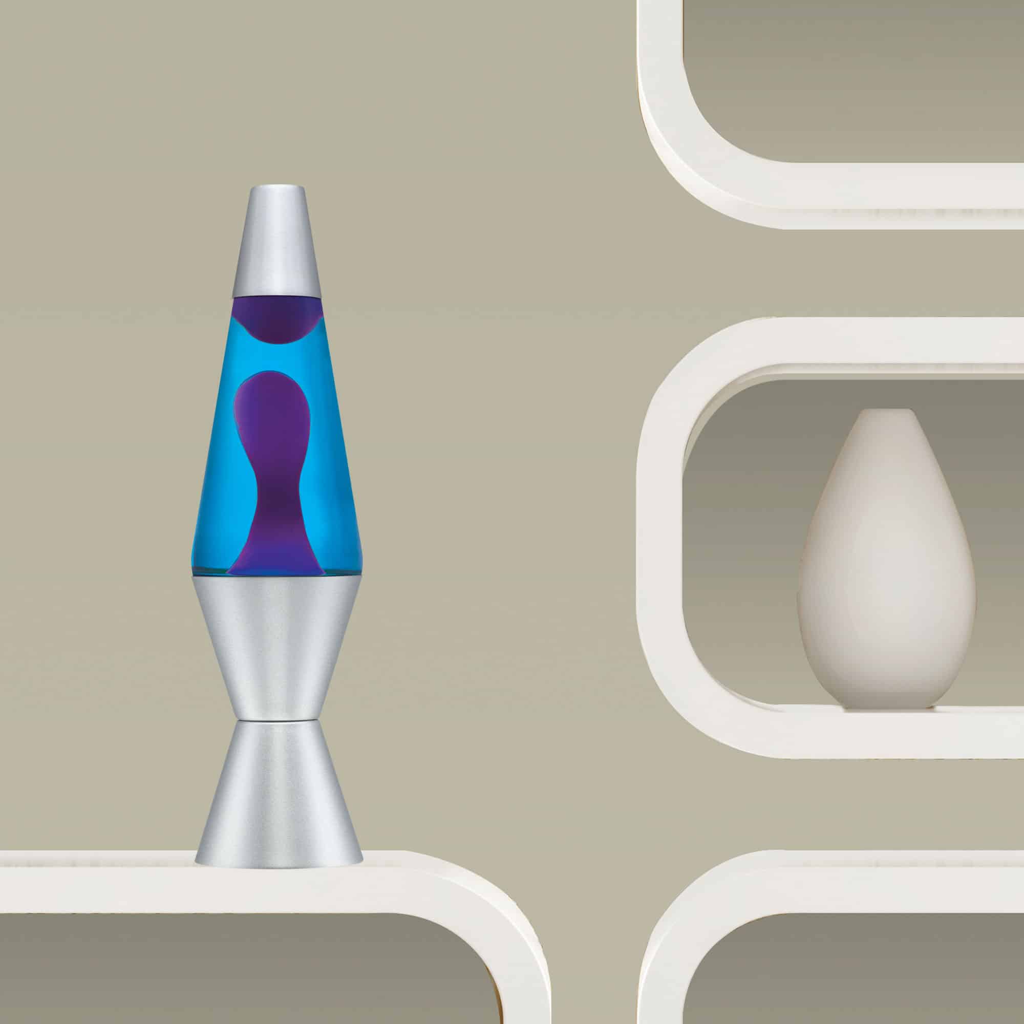 14.5” LAVA® Lamp – Purple/Blue/Silver on a shelf